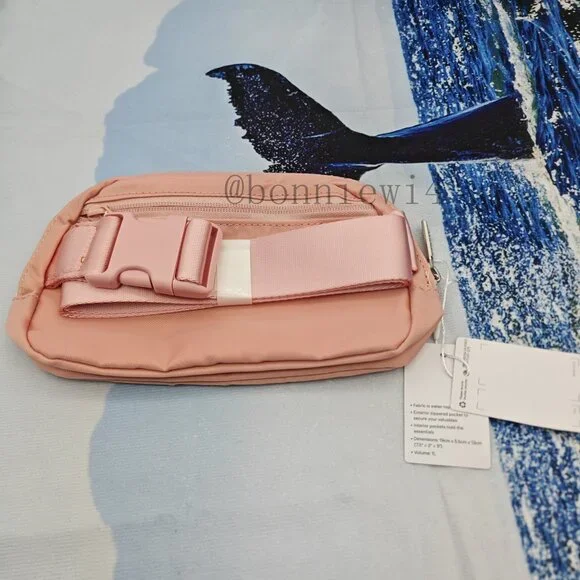 Lululemon Everywhere Crossbody Belt Bag 1L  Pink - Picture 2 of 4